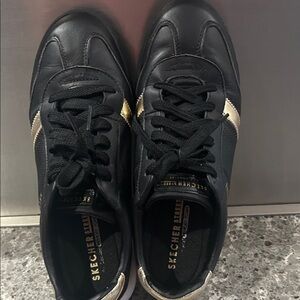 Skechers Street Black & Gold Women’s Lace-Up Sneakers